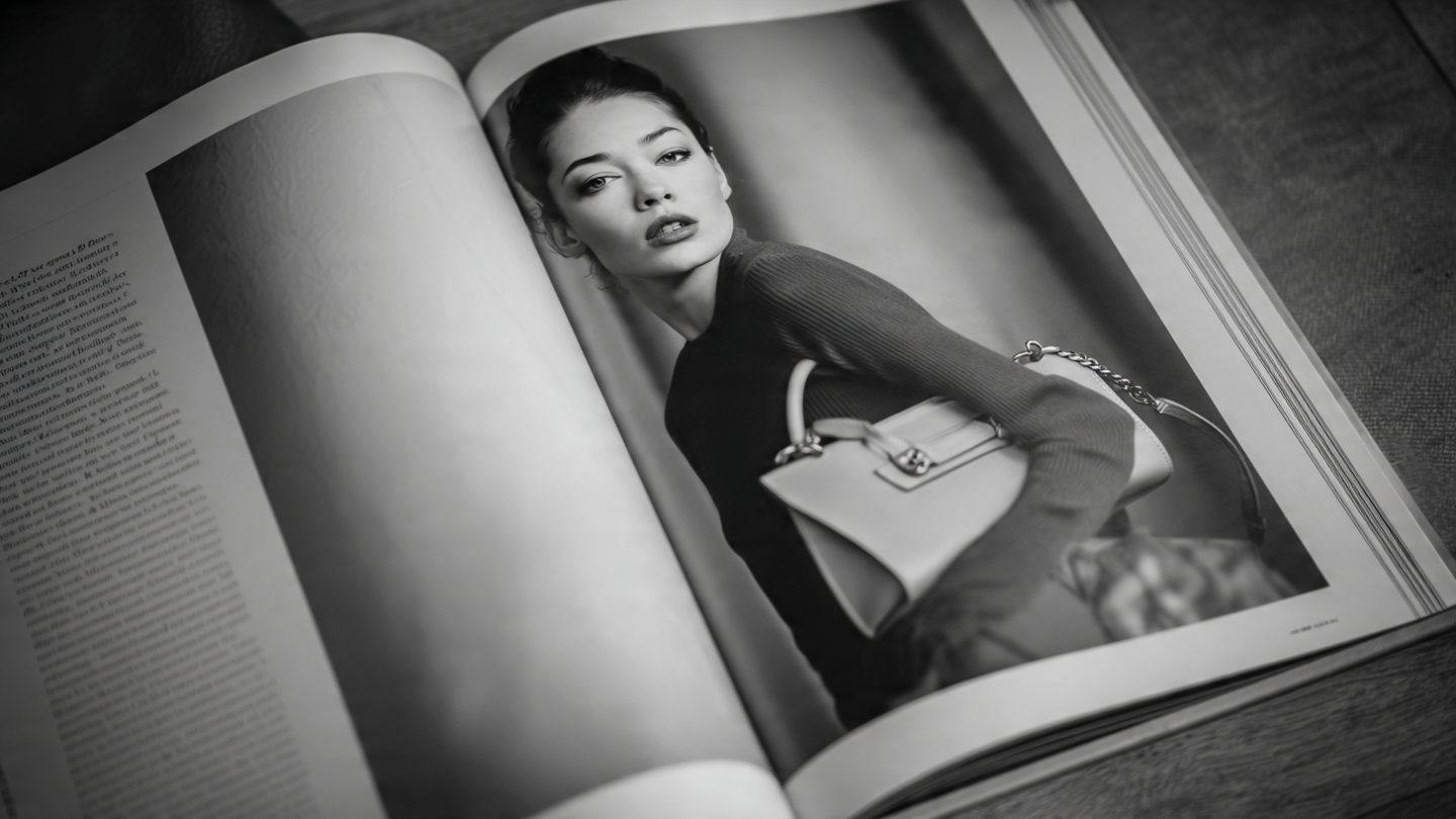 Stack of glossy fashion magazines